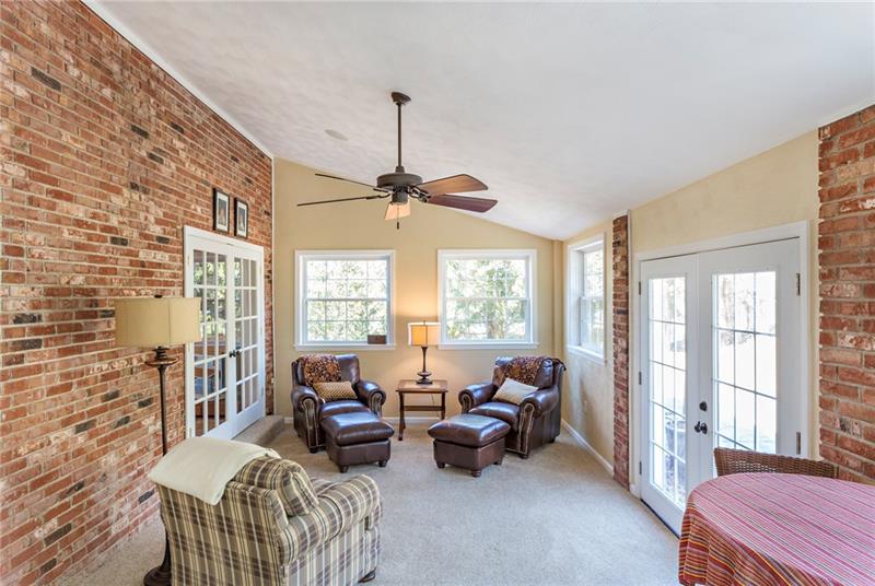 3835 Hills Church Road Export, PA 15632 - Photo 10 of 25 Sit and enjoy the view from the completely enclosed sunroom.