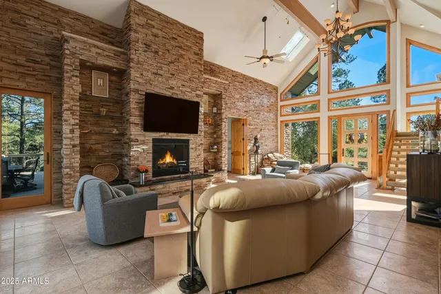 a kitchen with stainless steel appliances granite countertop a stove sink and cabinets