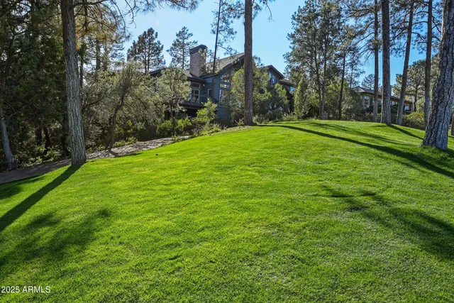 a lobby with furniture and floor to ceiling window