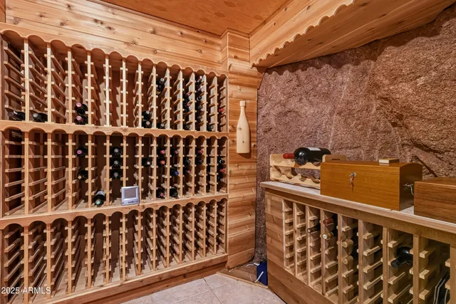 a stone fireplace with a fireplace