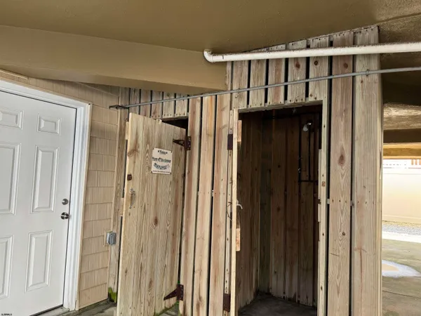 a view of entryway with wooden door