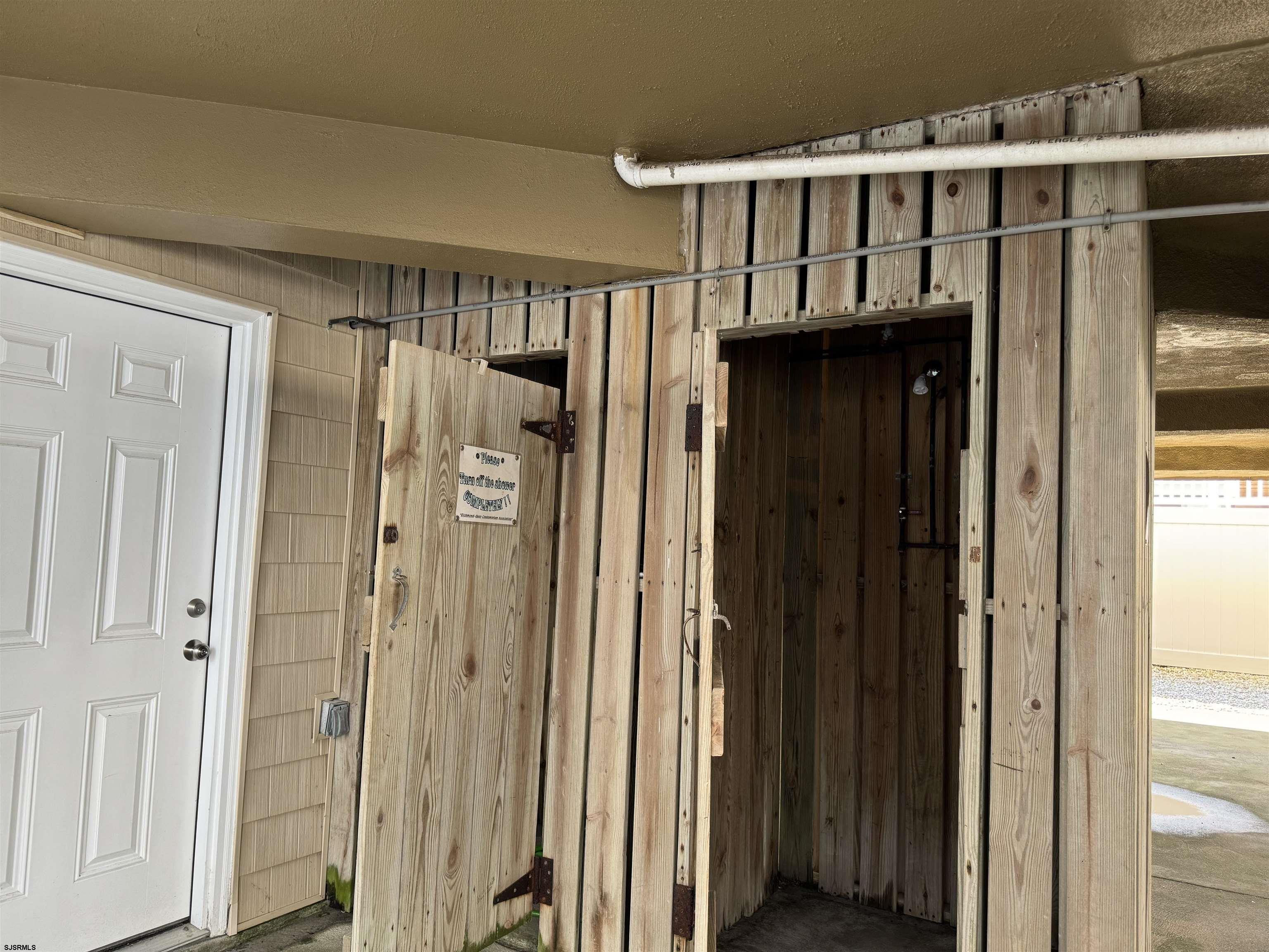 407 36th Street South, Unit 2 Brigantine, NJ 08203 - Photo 24 of 30 a view of entryway with wooden door