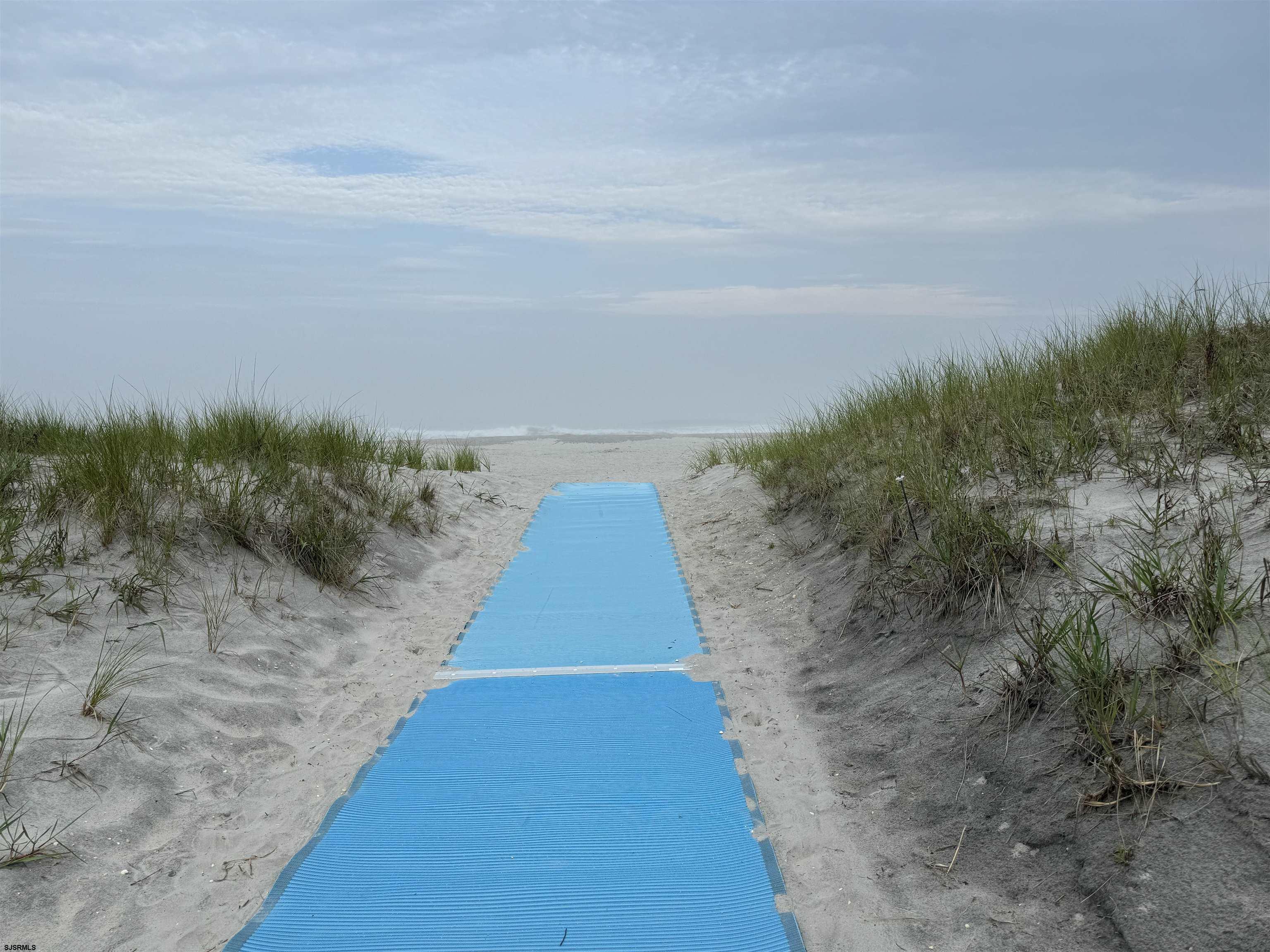 407 36th Street South, Unit 2 Brigantine, NJ 08203 - Photo 28 of 30 a view of pathway with yard