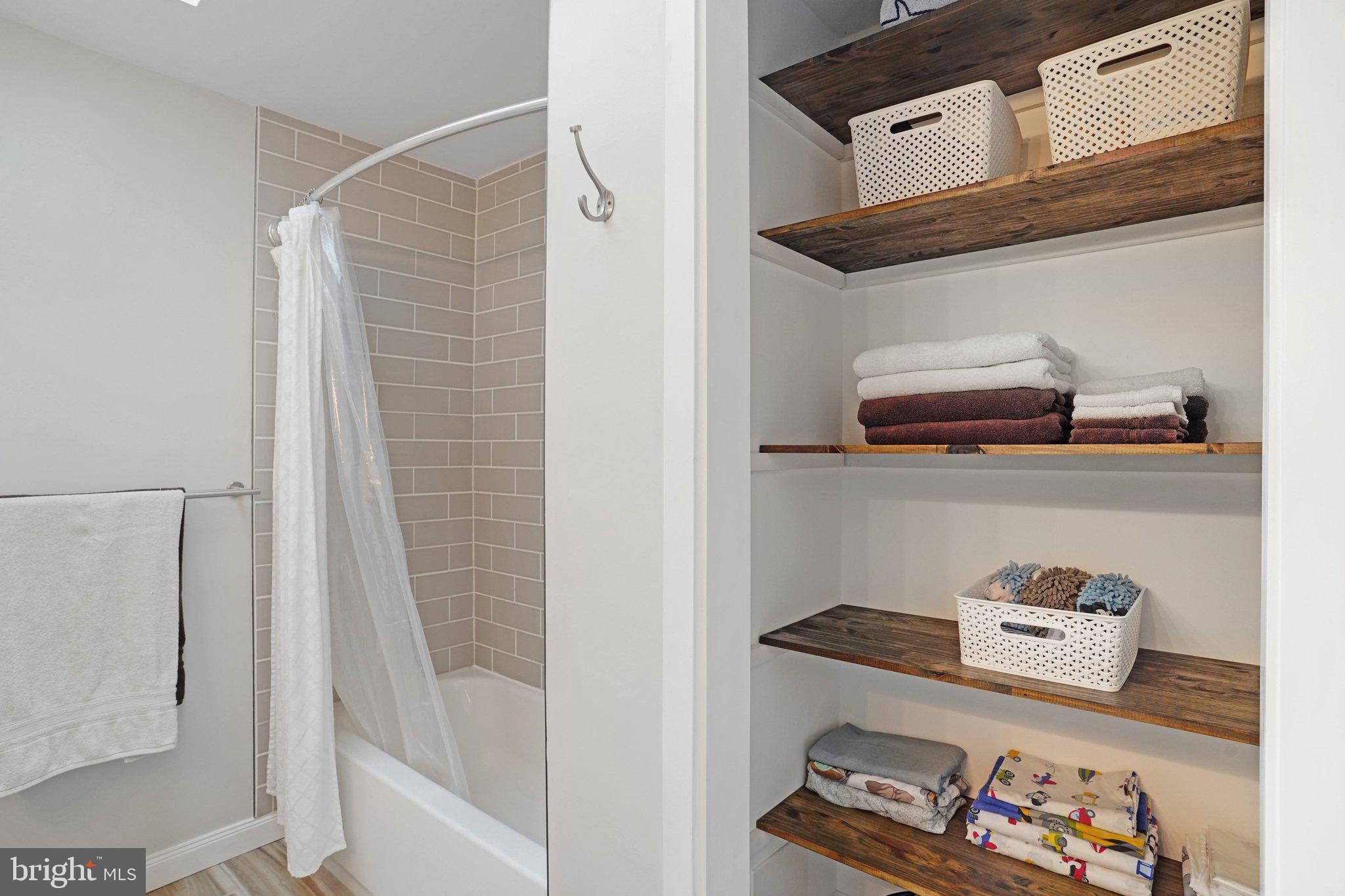 7628 Gralnick Place Springfield, VA 22153 - Photo 32 of 60 Ample linen closet on 2nd bathroom