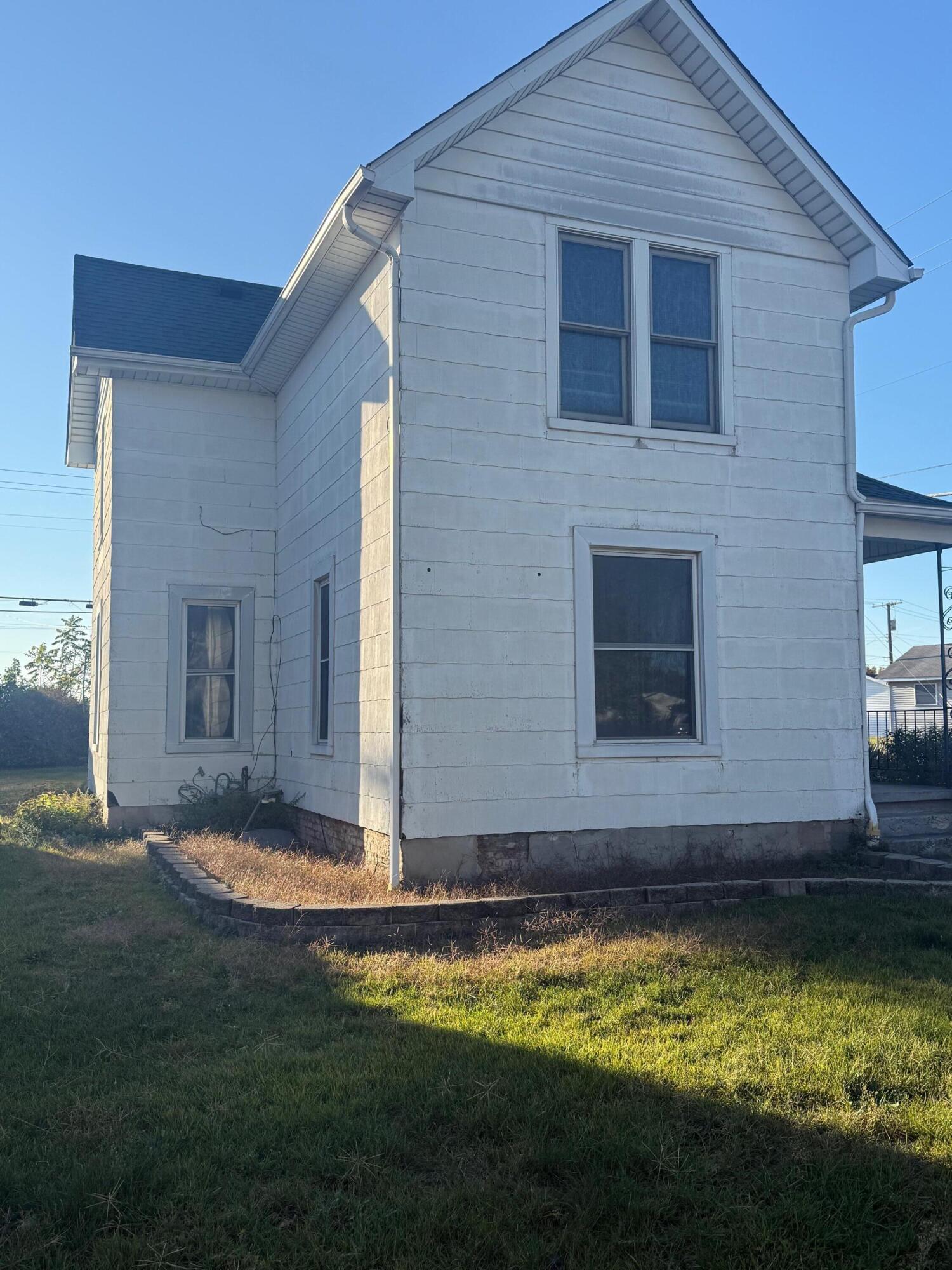 1601 Tennessee Street Michigan City, IN 46360 - Photo 1 of 5 a view of a house with swimming pool next to a yard