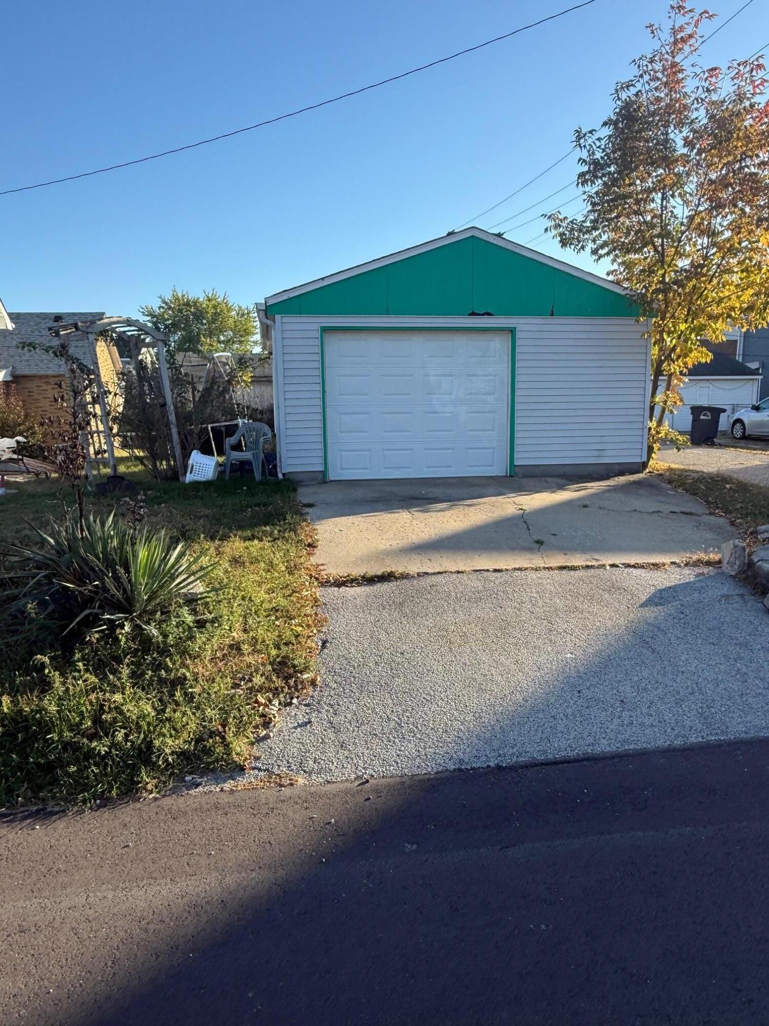 1601 Tennessee Street Michigan City, IN 46360 - Photo 5 of 5 a house with trees in front of it