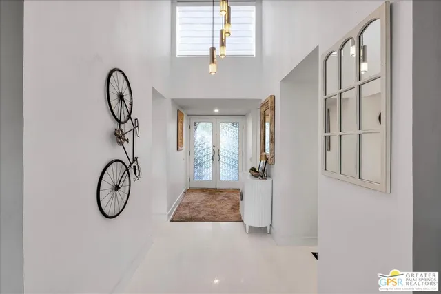 a bathroom with a granite countertop tub and a shower