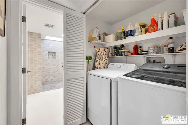 a utility room with dryer and washer