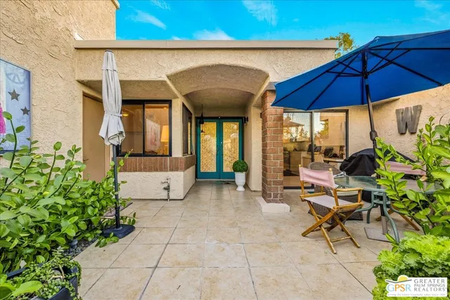 a view of a lounge chairs in patio