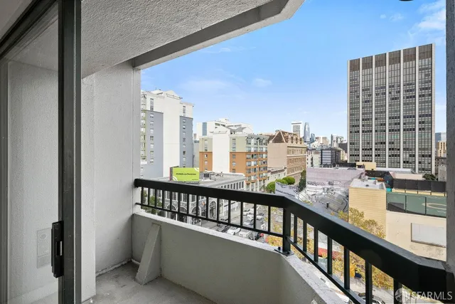 a view of a balcony with city view
