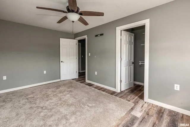 an aerial view of river residential houses with outdoor space and swimming pool