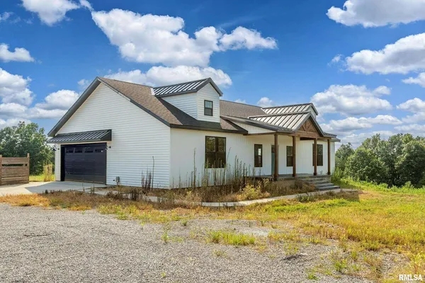 a front view of house with yard