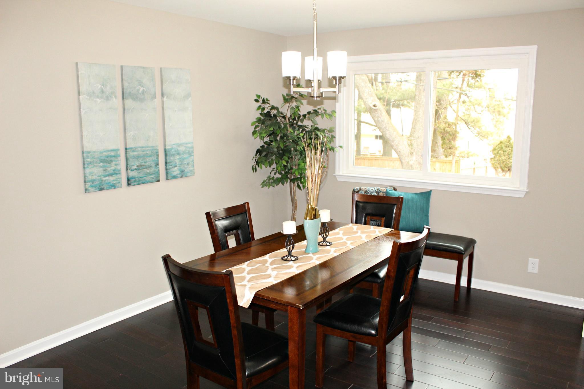 3707 Collier Road Randallstown, MD 21133 - Photo 11 of 29 New wood flooring in dining room!
