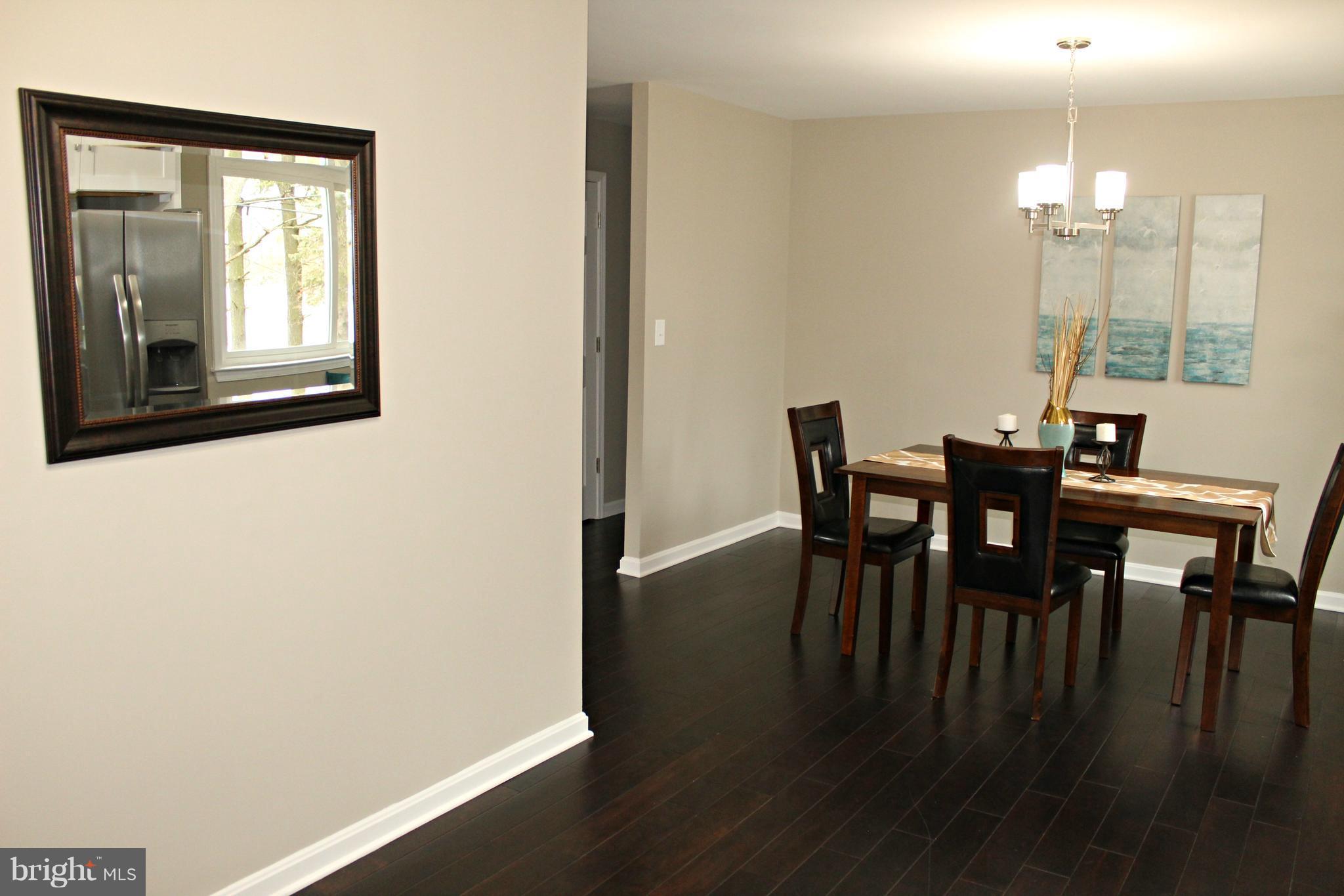 3707 Collier Road Randallstown, MD 21133 - Photo 12 of 29 New wood flooring and new paint!