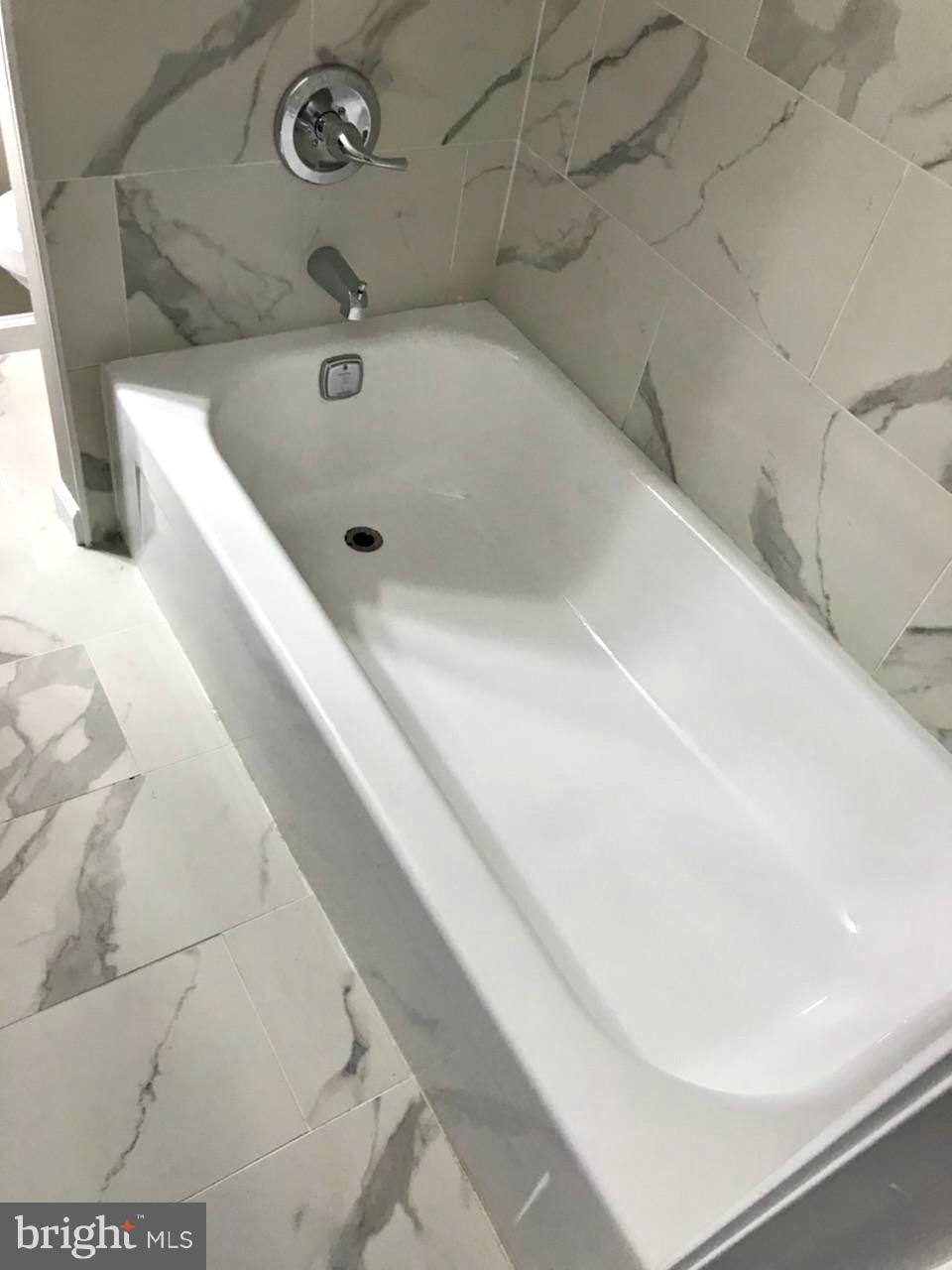 3707 Collier Road Randallstown, MD 21133 - Photo 25 of 29 Beautiful tile in finished basement bathroom!