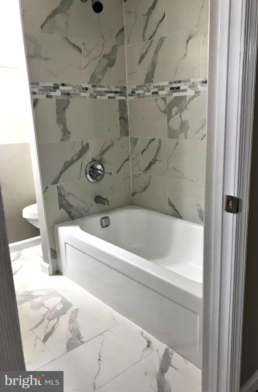 3707 Collier Road Randallstown, MD 21133 - Photo 6 of 29 Beautiful tile in finished basement bathroom!