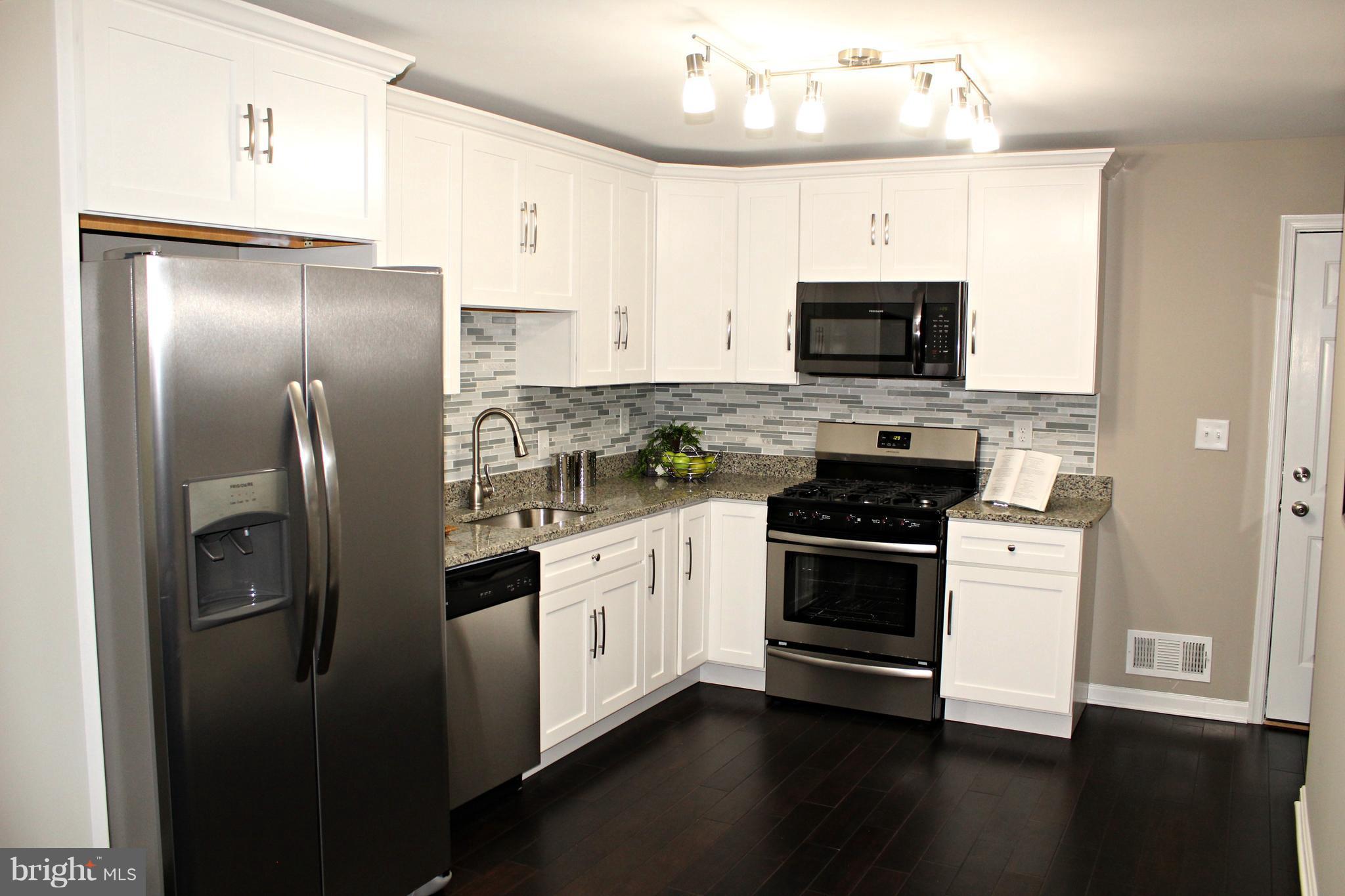 3707 Collier Road Randallstown, MD 21133 - Photo 7 of 29 New kitchen with granite and stainless steel!