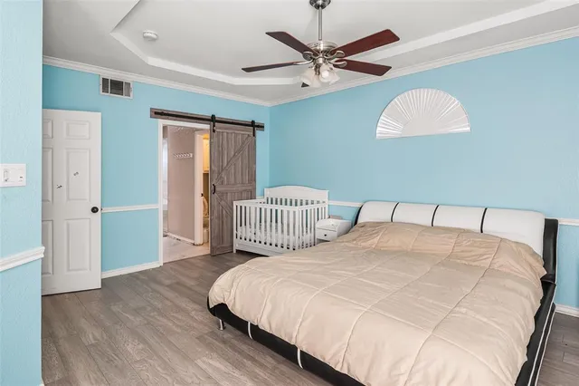 a bathroom with a shower and a sink