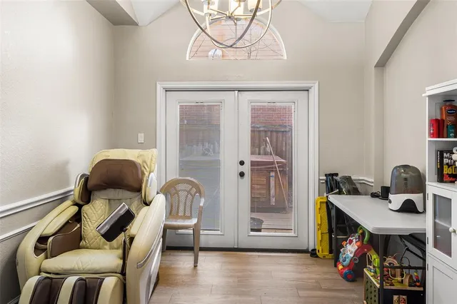 a view of a swimming pool with a patio and fire pit