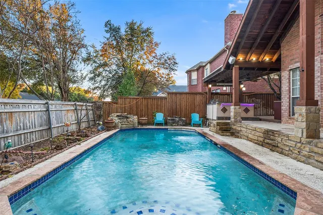 a kitchen with a stove and a sink