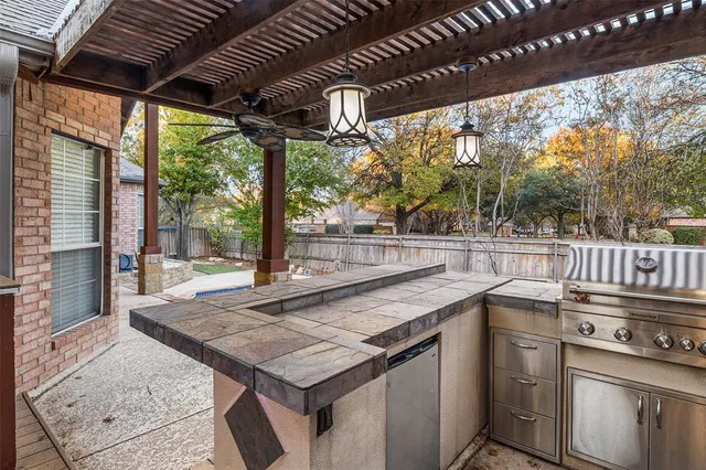 a view of a two chairs in the balcony