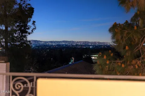 a view of a lake from a balcony