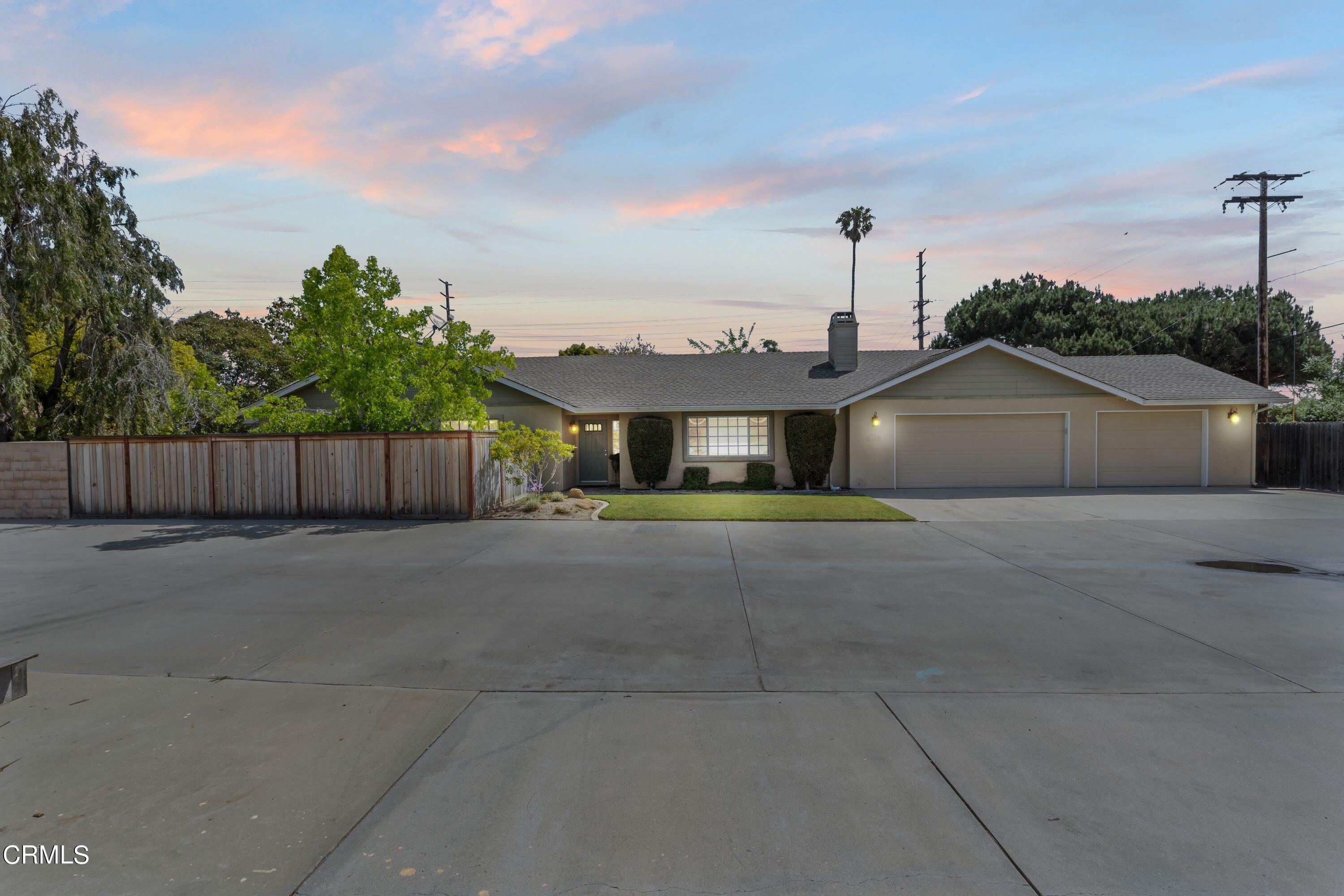 10975 Darling Road Ventura, CA 93004 - Photo 2 of 49 a front view of a house with wooden fence