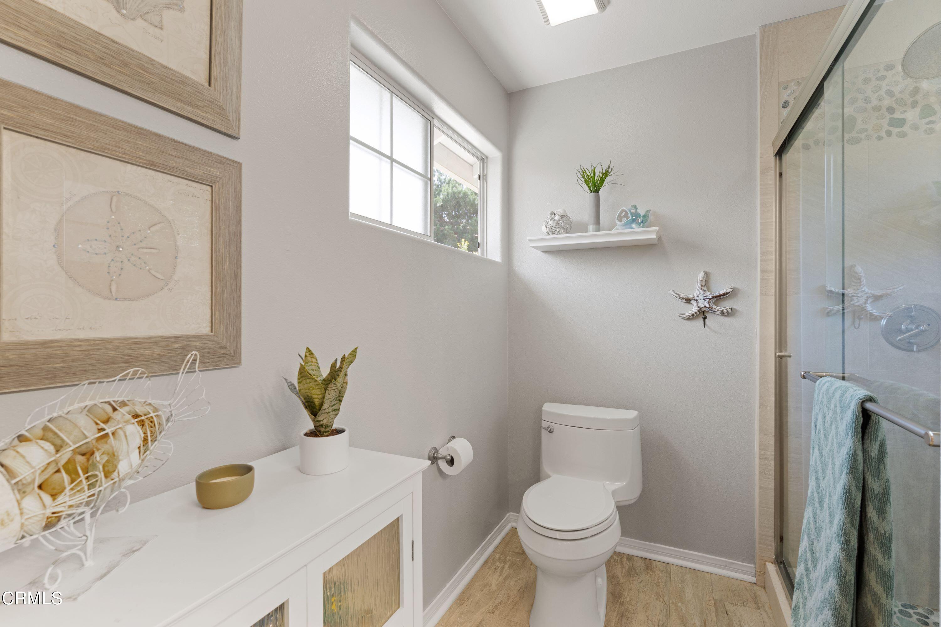10975 Darling Road Ventura, CA 93004 - Photo 22 of 49 a bathroom with a sink and a toilet