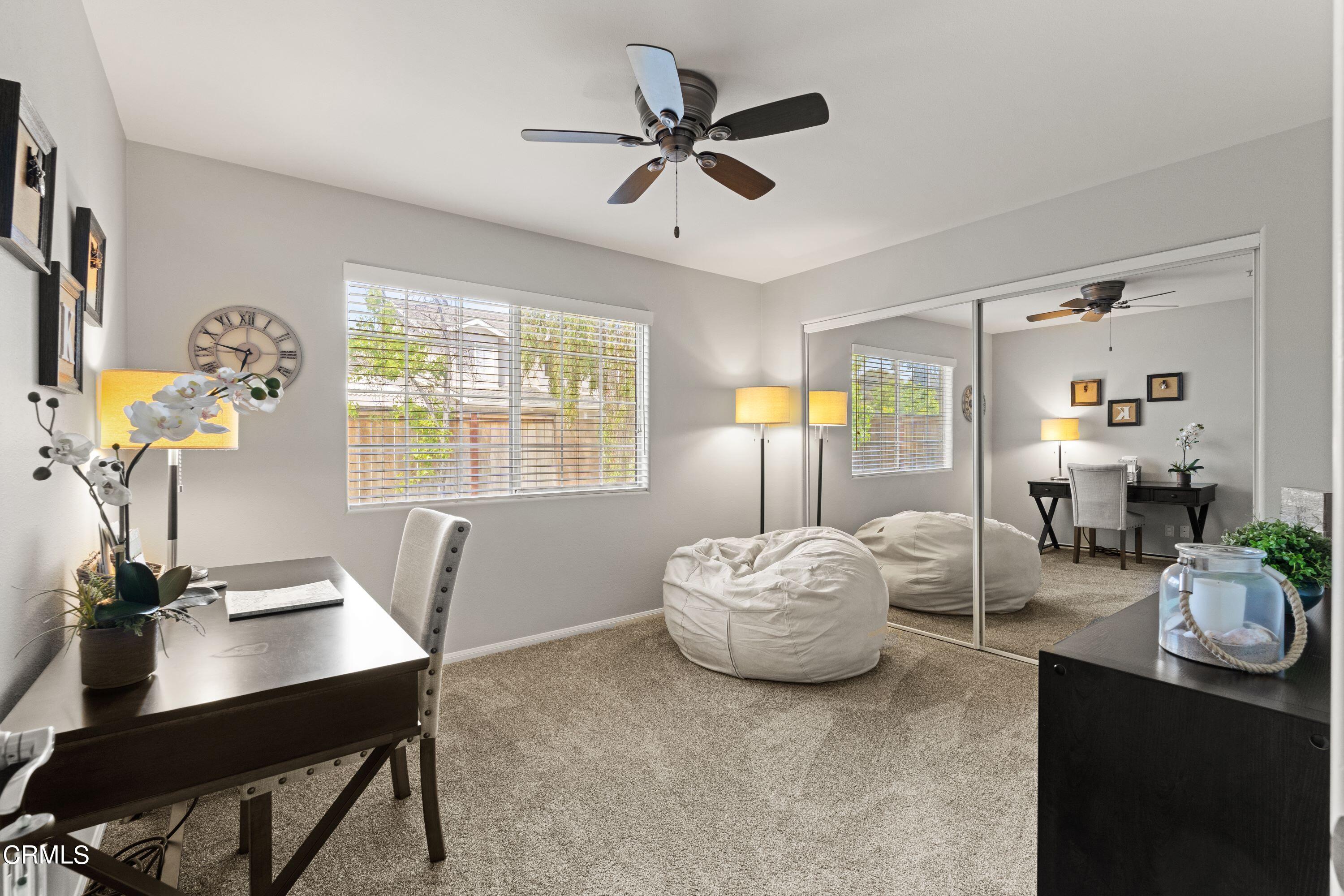 10975 Darling Road Ventura, CA 93004 - Photo 27 of 49 a living room with furniture and a large window