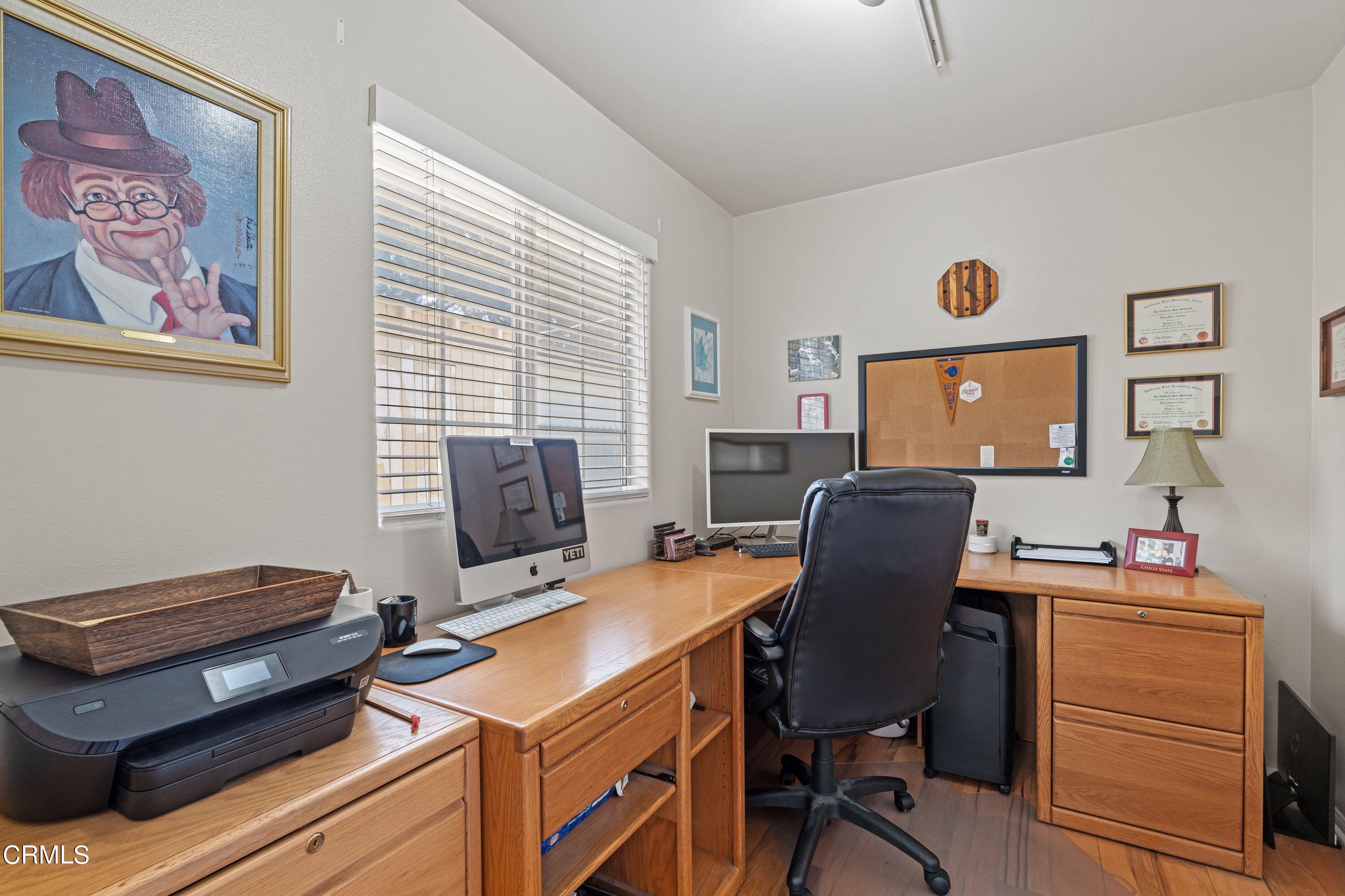 10975 Darling Road Ventura, CA 93004 - Photo 30 of 49 a view of a workspace with furniture and a window