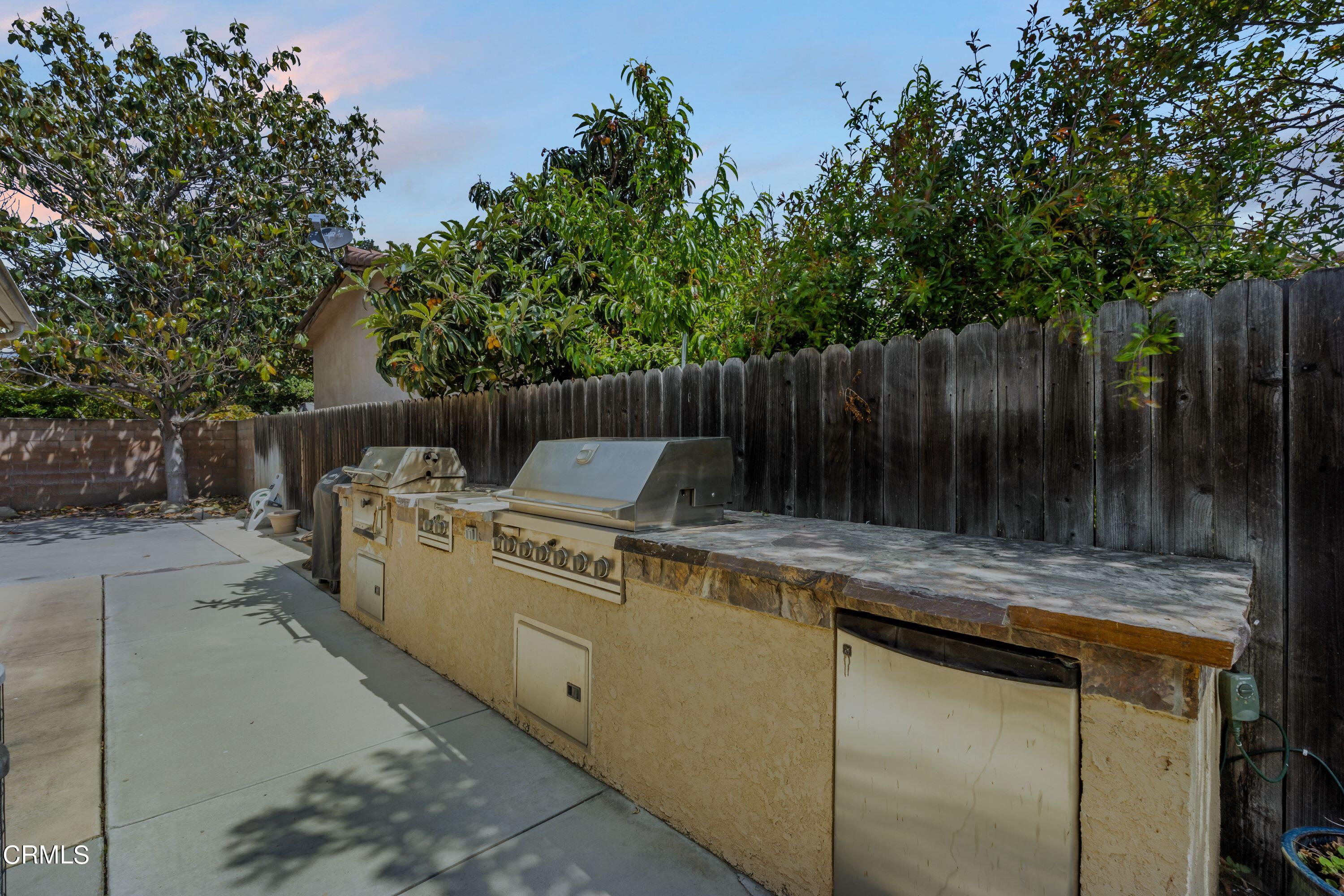 10975 Darling Road Ventura, CA 93004 - Photo 34 of 49 a view of a backyard with furniture