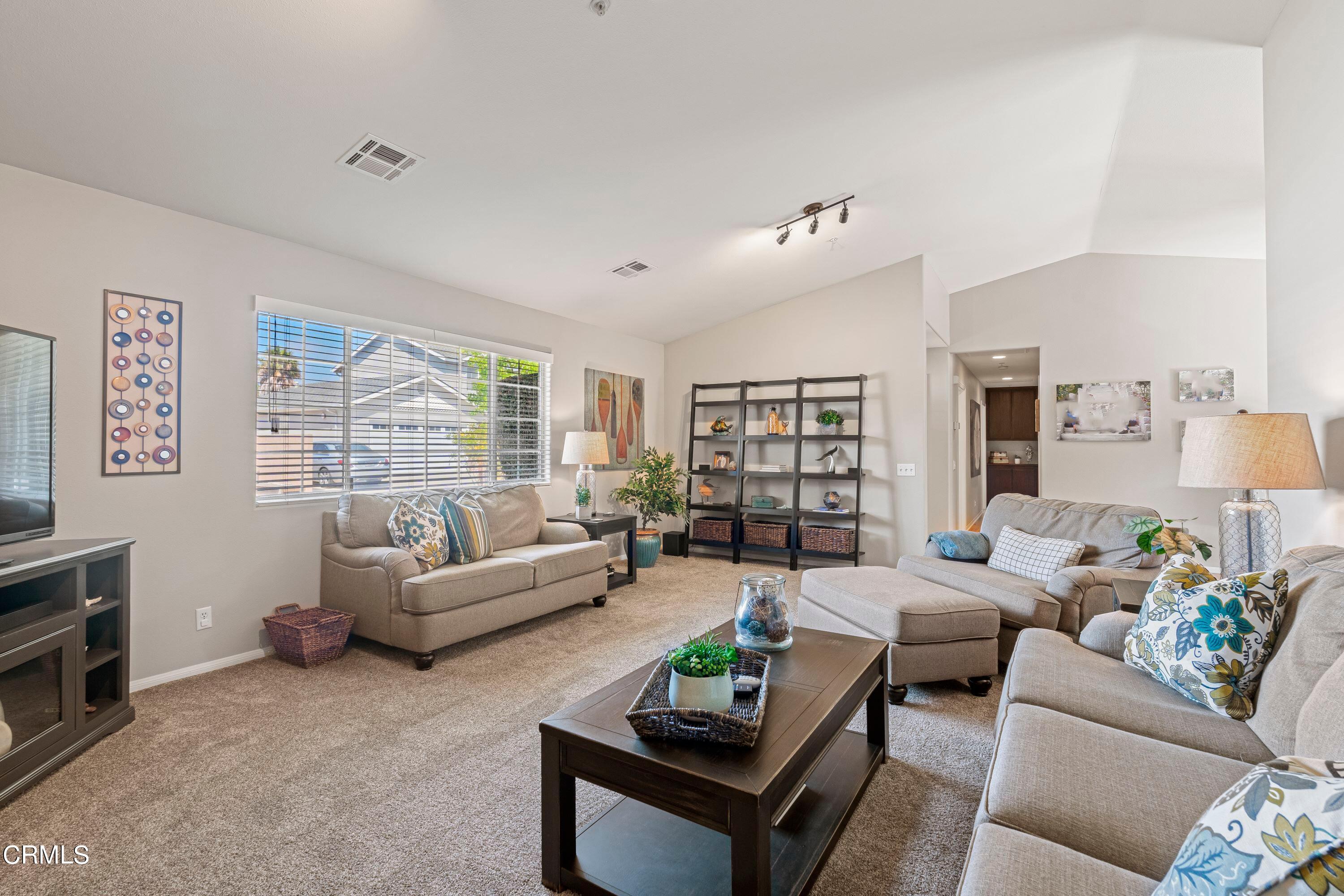 10975 Darling Road Ventura, CA 93004 - Photo 8 of 49 a living room with furniture and a large window