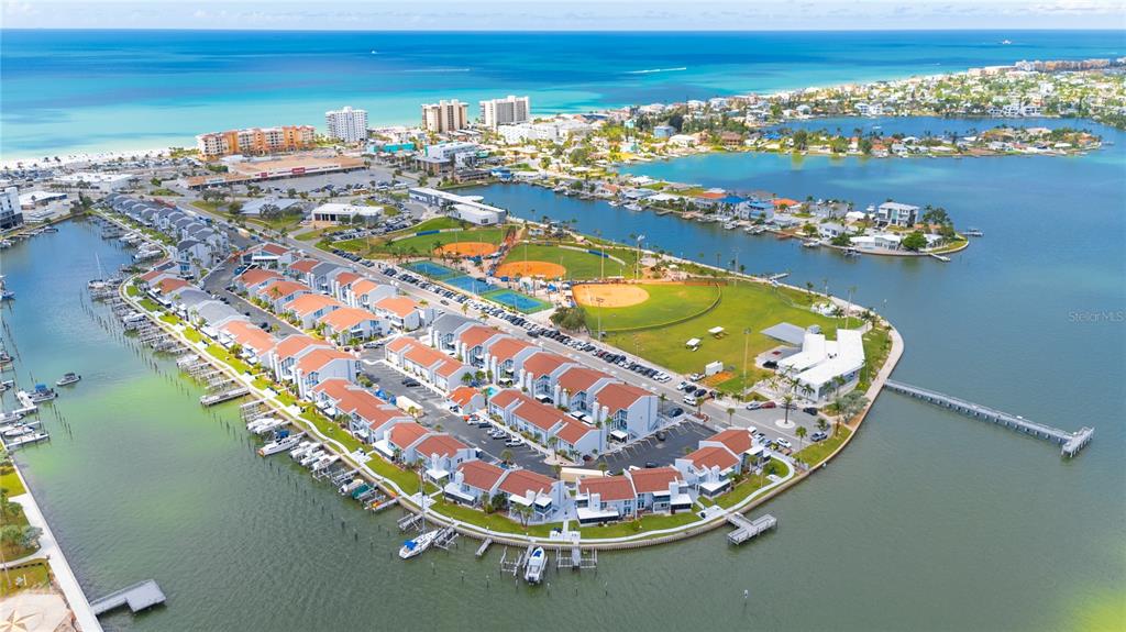 230 Medallion Boulevard, Unit E Madeira Beach, FL 33708 - Photo 27 of 35 a picture of city view with lake view