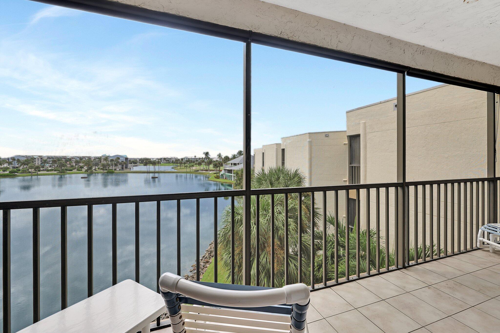221 Northeast Plantation Road, Unit 406 Stuart, FL 34996 - Photo 31 of 58 a view of a chair in the balcony