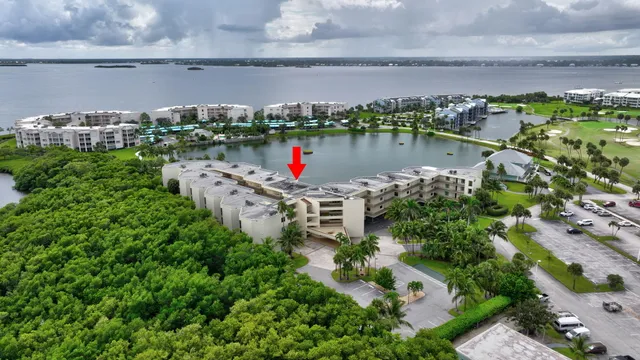 an aerial view of house yard swimming pool and outdoor seating