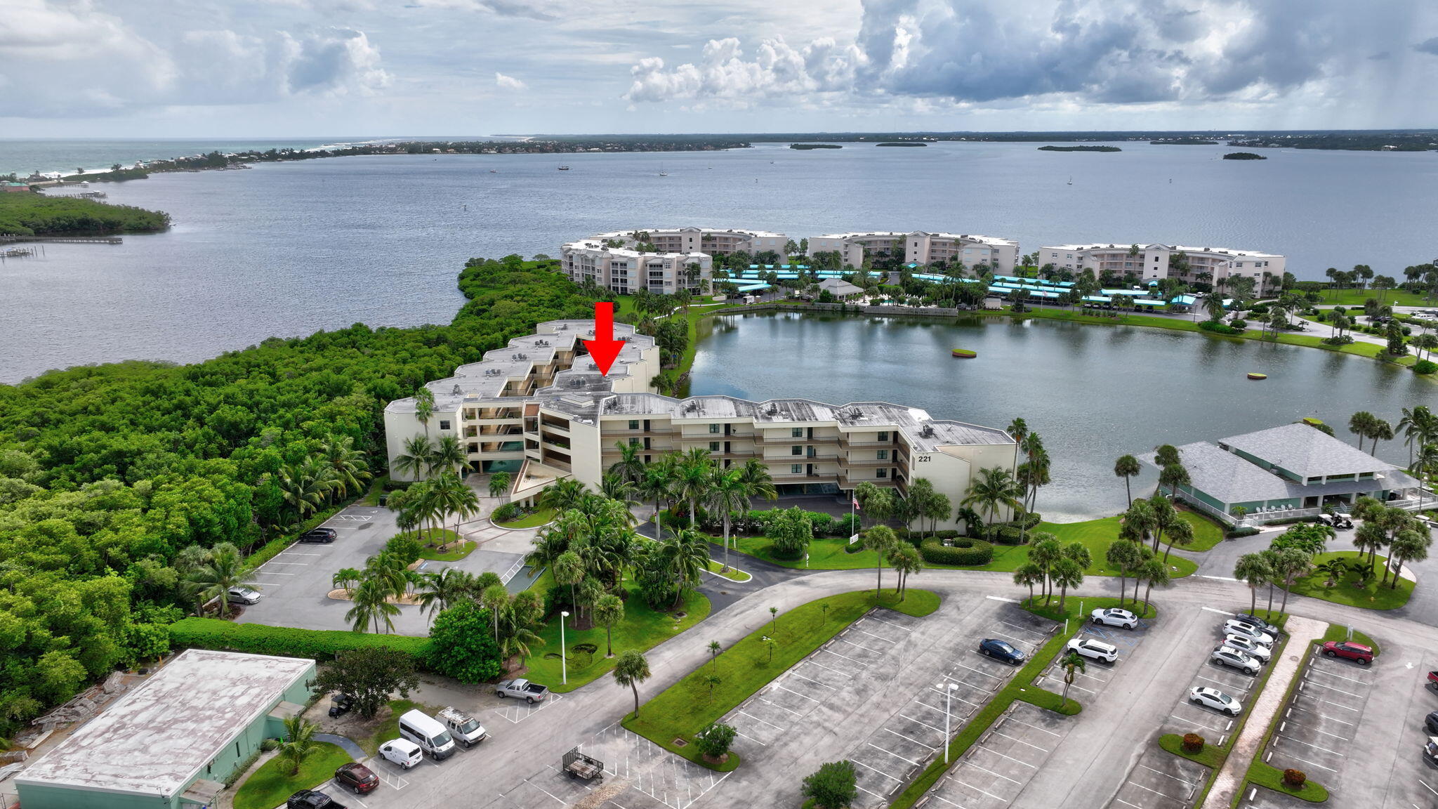 221 Northeast Plantation Road, Unit 406 Stuart, FL 34996 - Photo 44 of 58 a view of a lake with a floor and a large space