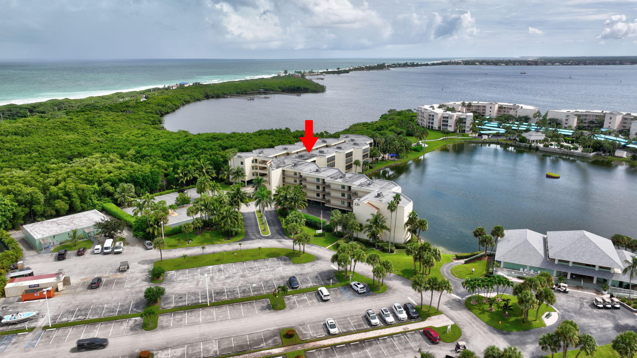 221 Northeast Plantation Road, Unit 406 Stuart, FL 34996 - Photo 45 of 58 a view of a lake with a lake