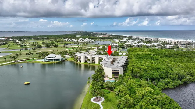 a view of a field with an ocean
