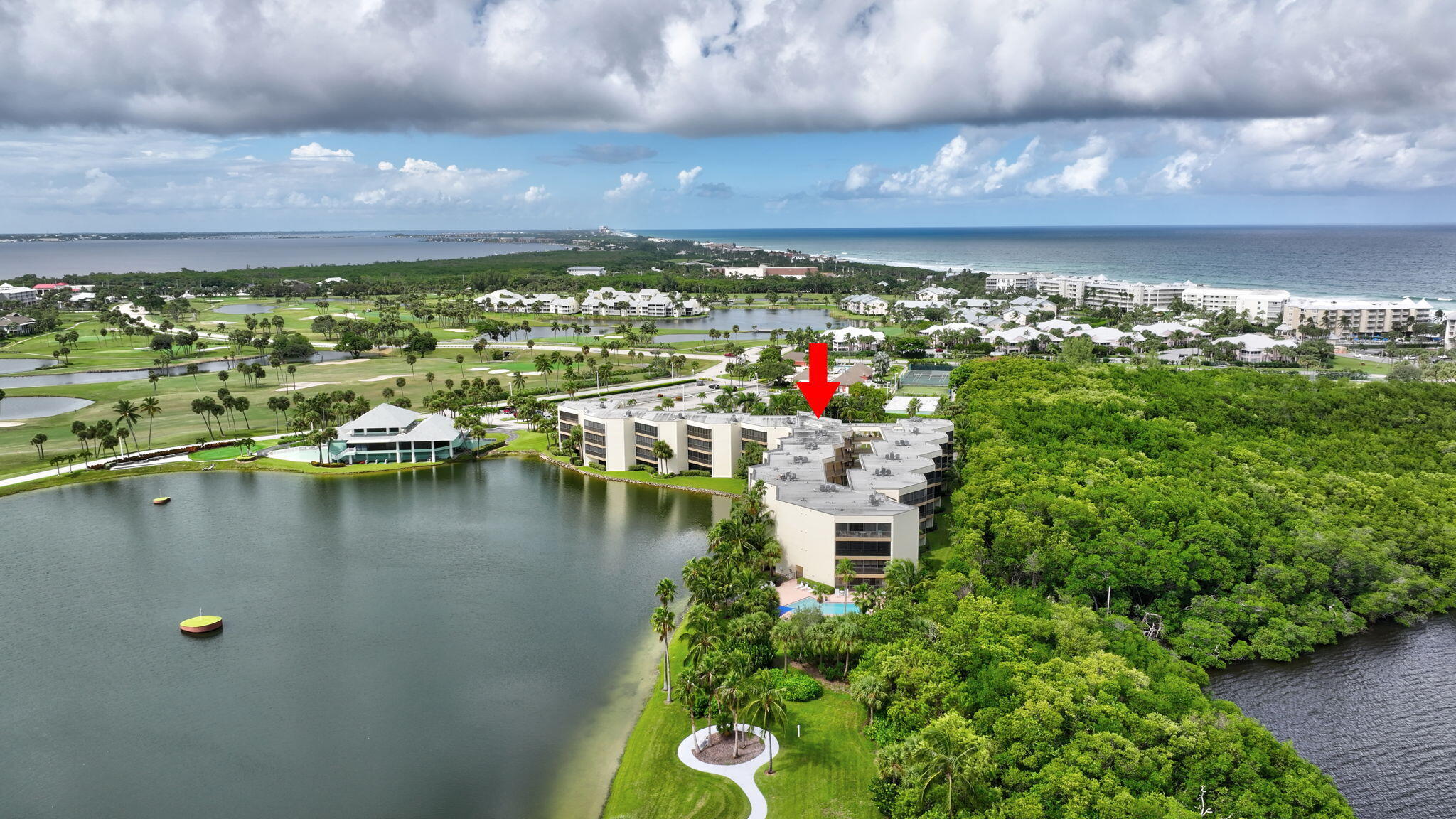 221 Northeast Plantation Road, Unit 406 Stuart, FL 34996 - Photo 48 of 58 a view of a lake