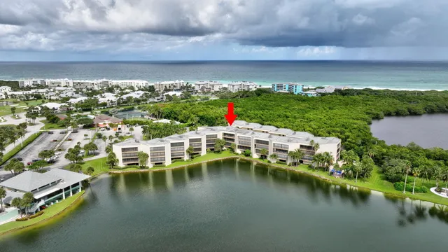 a view of a lake with a yard