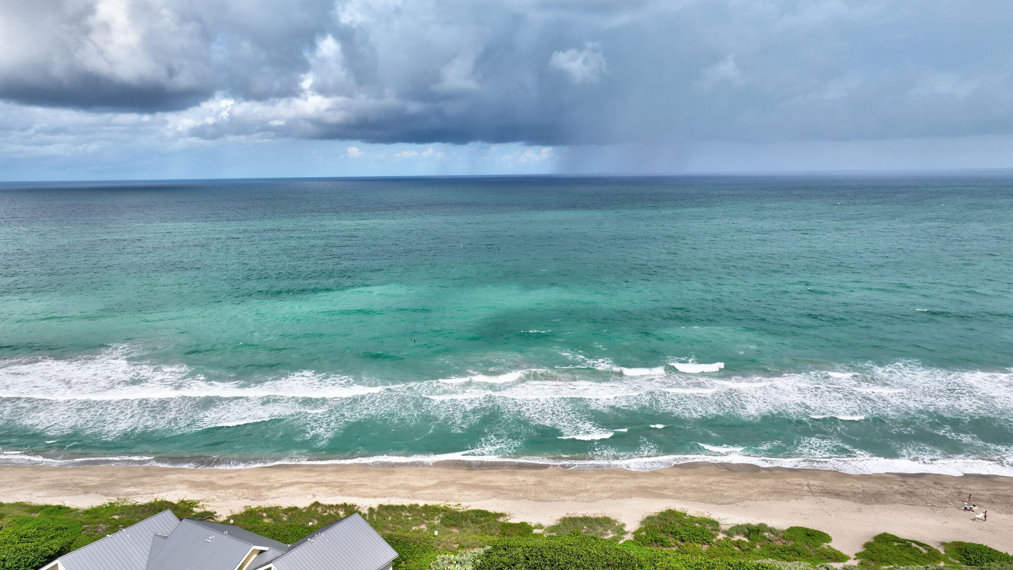 221 Northeast Plantation Road, Unit 406 Stuart, FL 34996 - Photo 56 of 58 a view of a lake with a yard