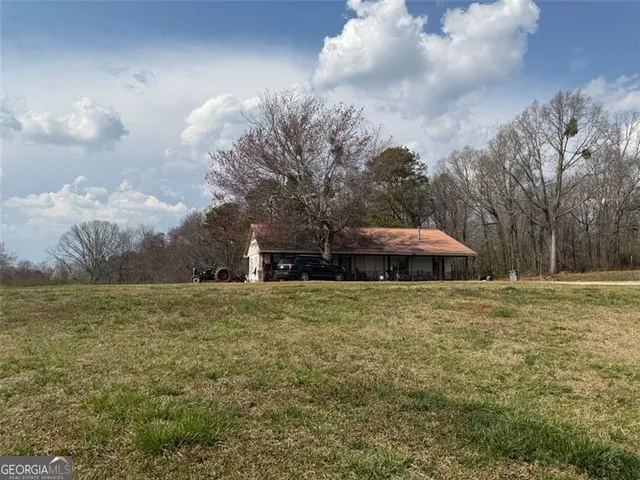 a fire hydrant in the middle of a field