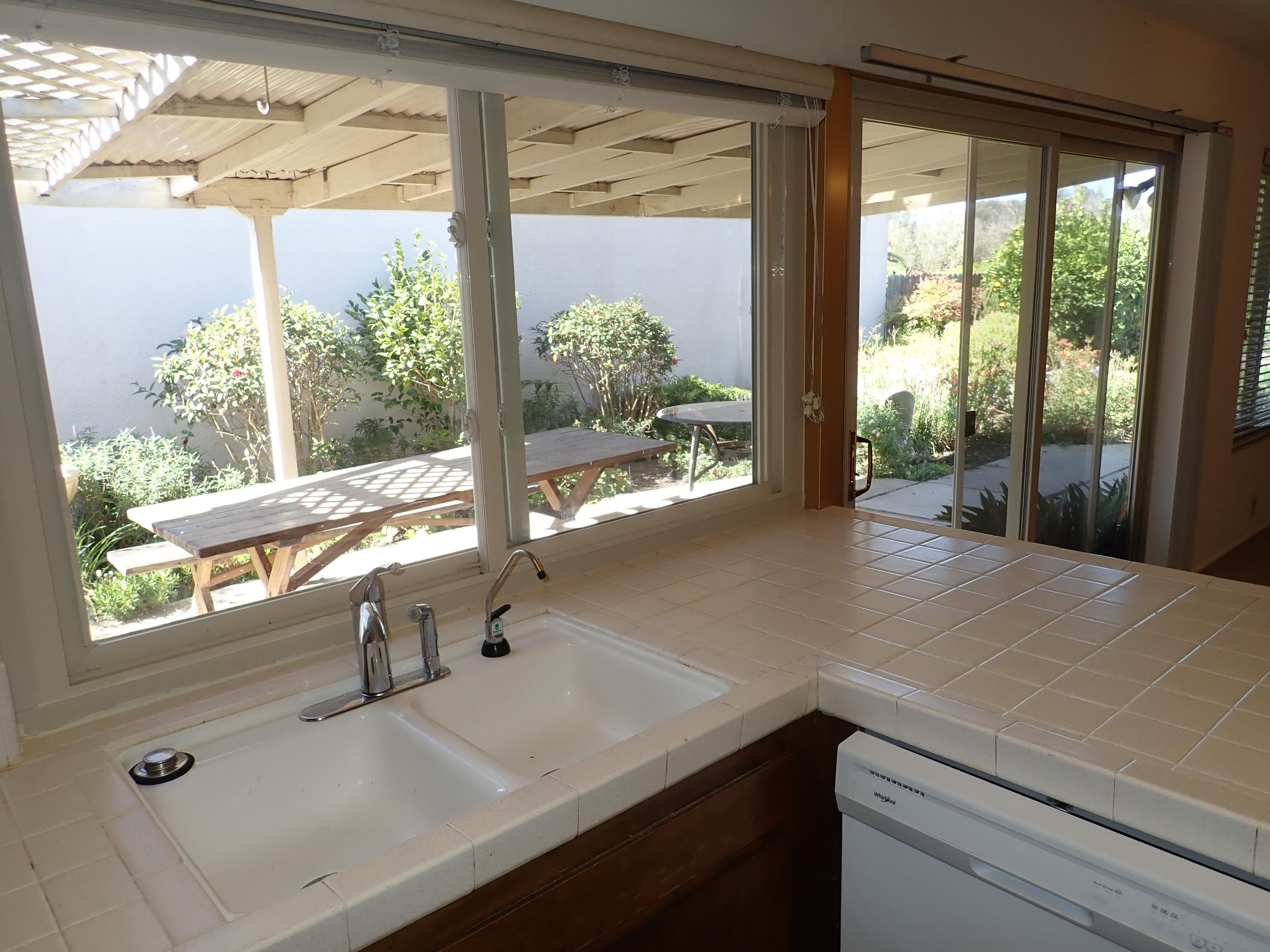 483 Reed Court Goleta, CA 93117 - Photo 15 of 37 a kitchen with a sink and a large window