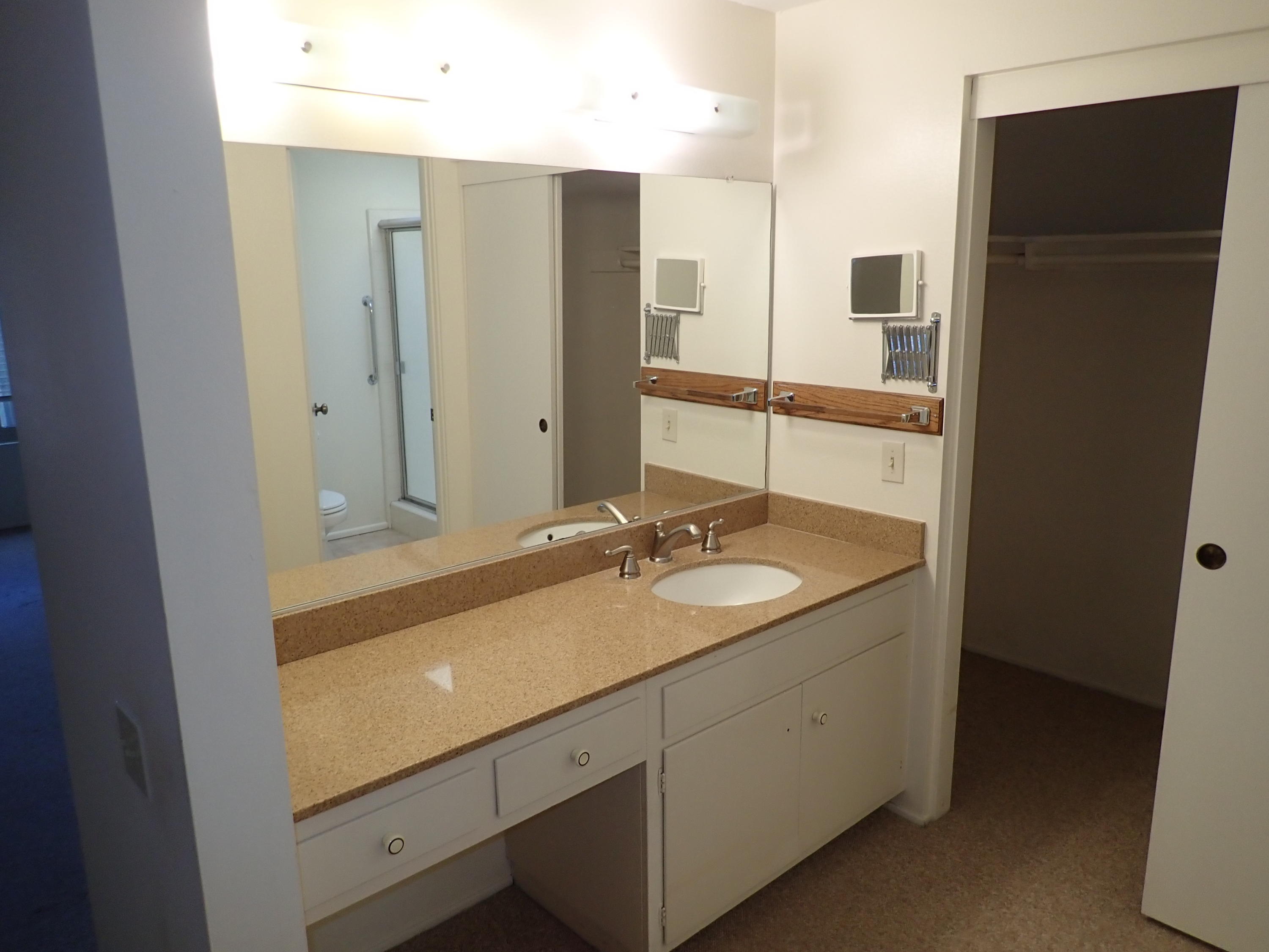 483 Reed Court Goleta, CA 93117 - Photo 17 of 37 a bathroom with a sink and a mirror
