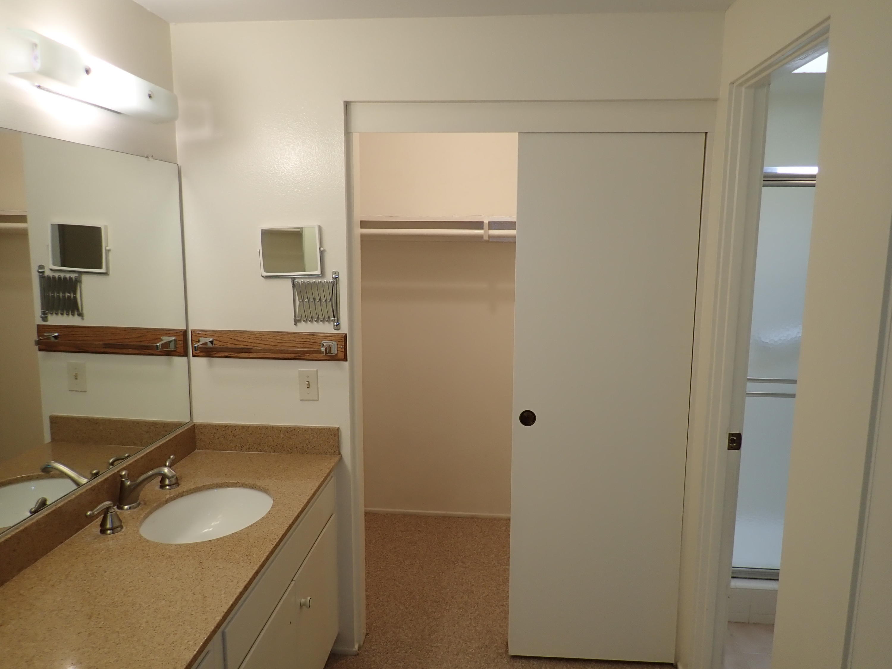 483 Reed Court Goleta, CA 93117 - Photo 18 of 37 a bathroom with a sink and a mirror