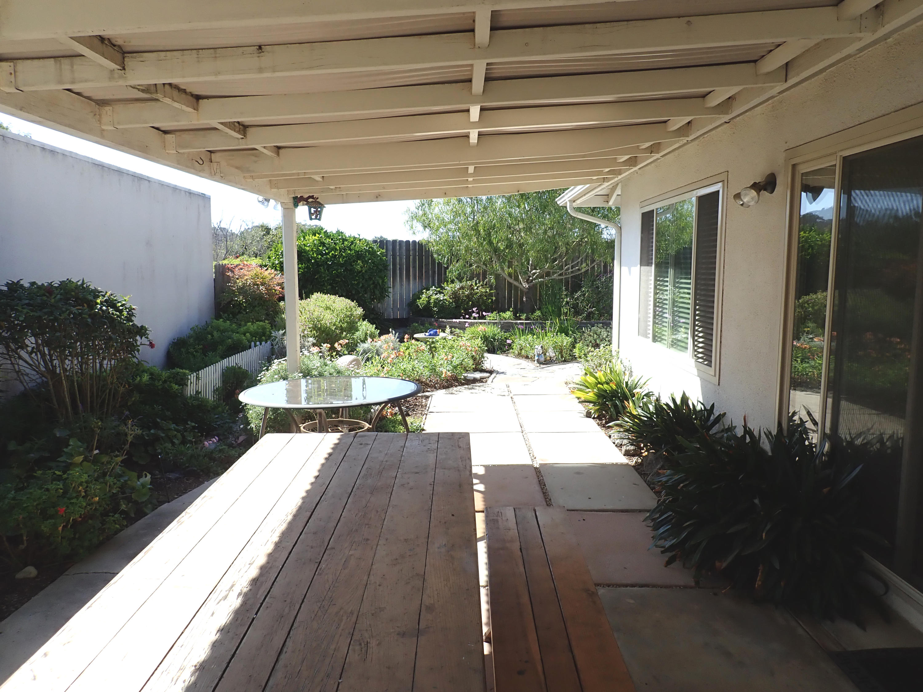 483 Reed Court Goleta, CA 93117 - Photo 25 of 37 a view of a porch with furniture and garden