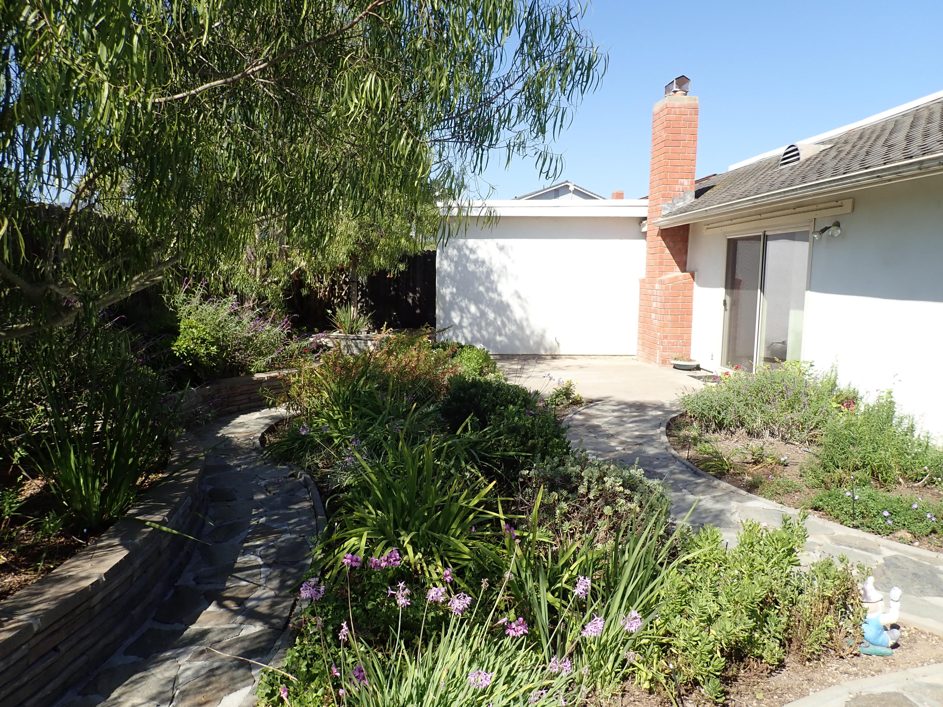 483 Reed Court Goleta, CA 93117 - Photo 29 of 37 a front view of a house with a yard