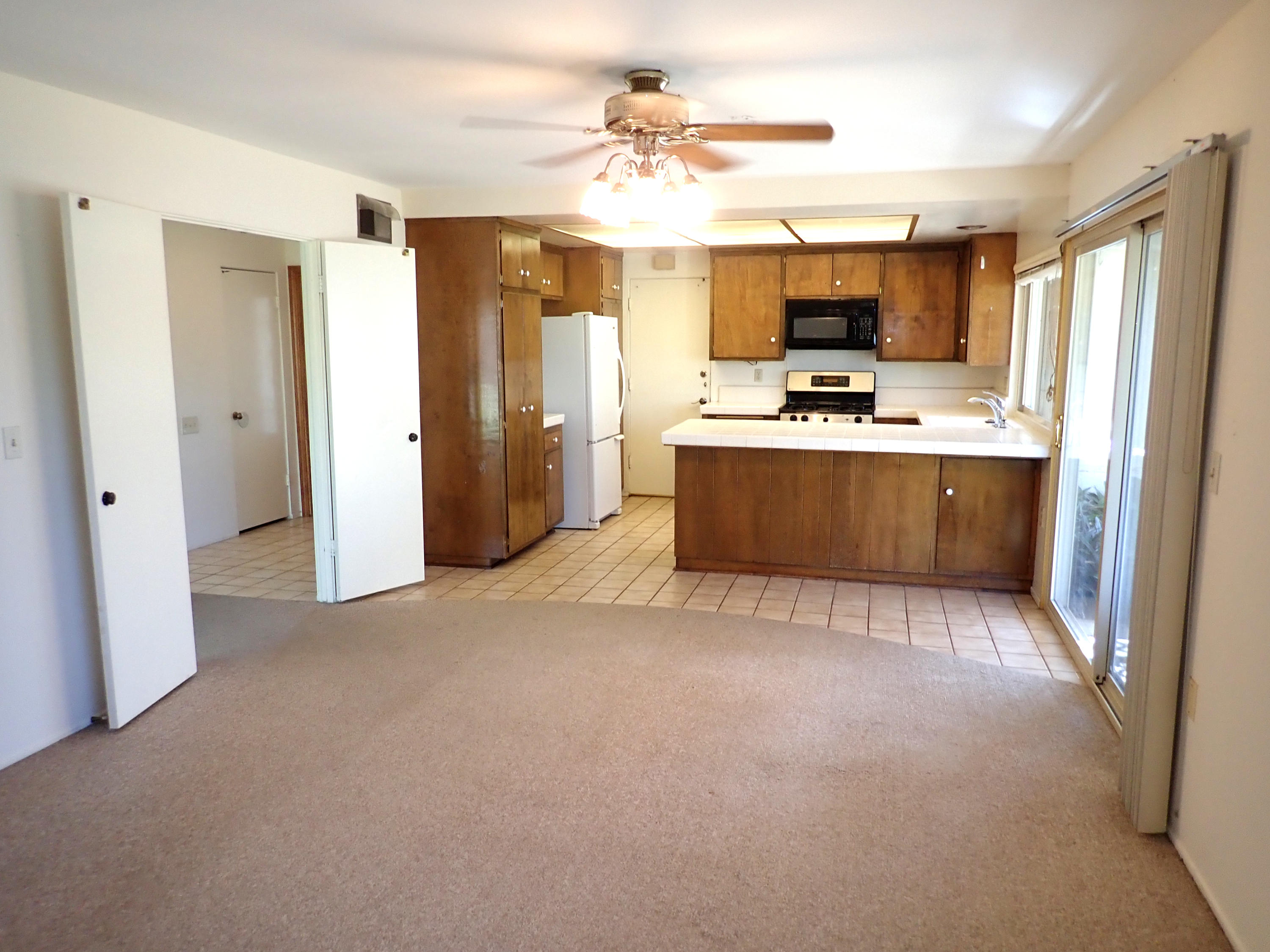 483 Reed Court Goleta, CA 93117 - Photo 9 of 37 a view of kitchen with sink refrigerator and window