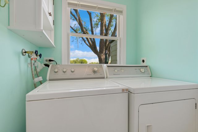 Undisclosed Address Buffalo Grove, IL 60089 - Photo 19 of 30 a utility room with dryer and washer