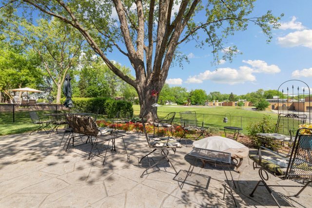 Undisclosed Address Buffalo Grove, IL 60089 - Photo 25 of 30 a view of a patio with furniture and garden